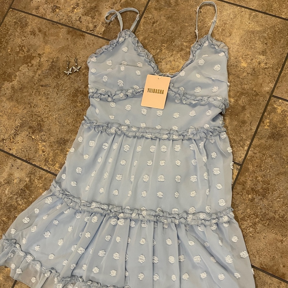 Super cute, adorable sundress never worn.